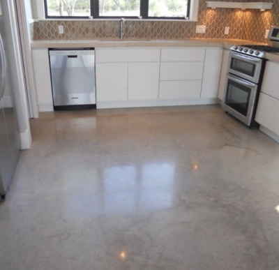 Stained and polished concrete kitchen floor.