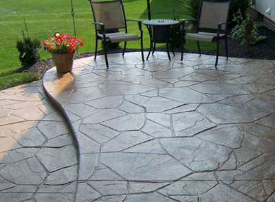 Sandstone looking stamped concrete patio.