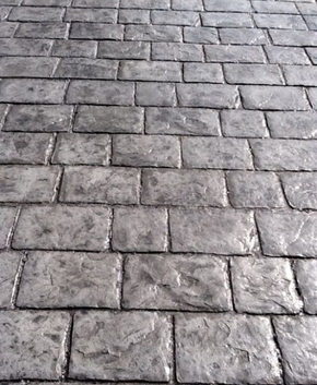 Weathered and worn old stone style stamped concrete